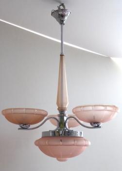 White metal chandelier with pink shades White metal chandelier with pink shades
